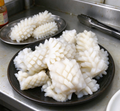 Delicate Squid Slices: Perfectly Marinated and Ready to Enjoy